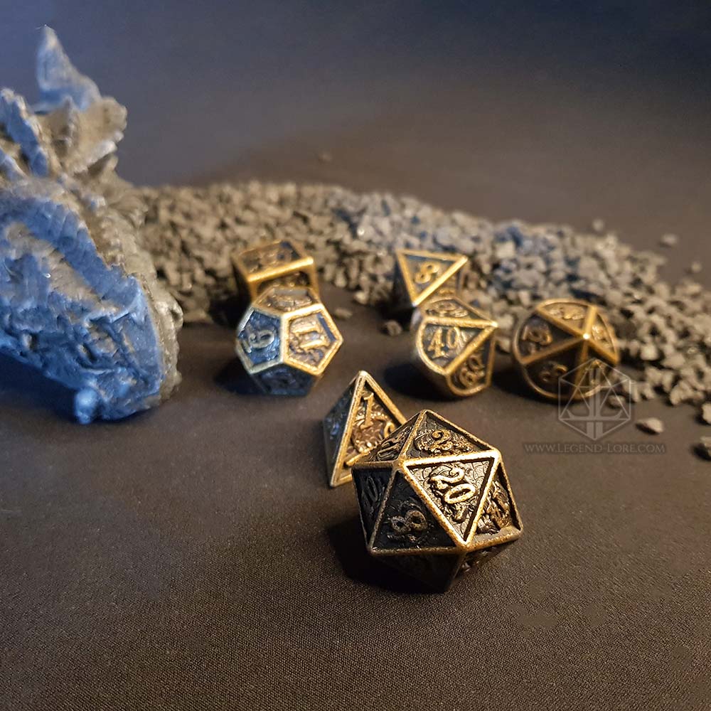 Get the Power of Sage's Elder Dragon with the True Silver Hollow Metal Polyhedral Dice Set from Sage's Dragonstones