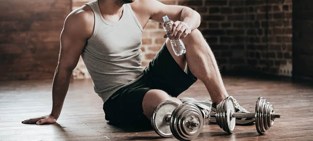 Power Up Your Workout with Dumbbell Cleans - Expert Exercise Guides on Bodybuilding.com