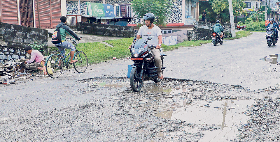 Potholes cover the Glass City