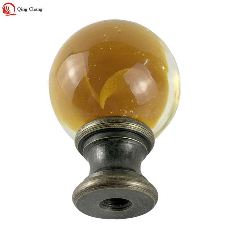 https://www.qingchanglighting.com/glass-lamp-finials-factory-new-design-amber-color-for-lamp-harp-qingchang-product/