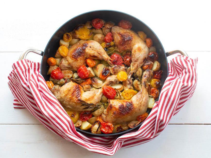 How to make crispy chicken legs with cherry tomatoes, leeks and potatoes | The Independent